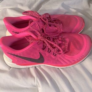 Hot pink Nike sneakers